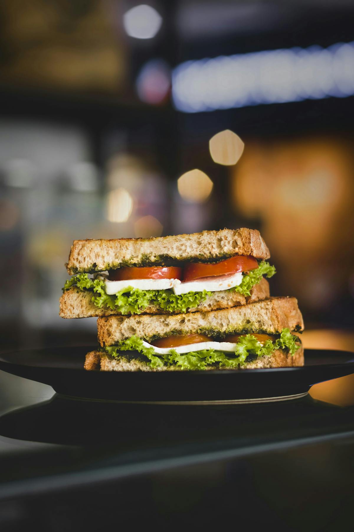 a close up of a sandwich sitting on top of a table
