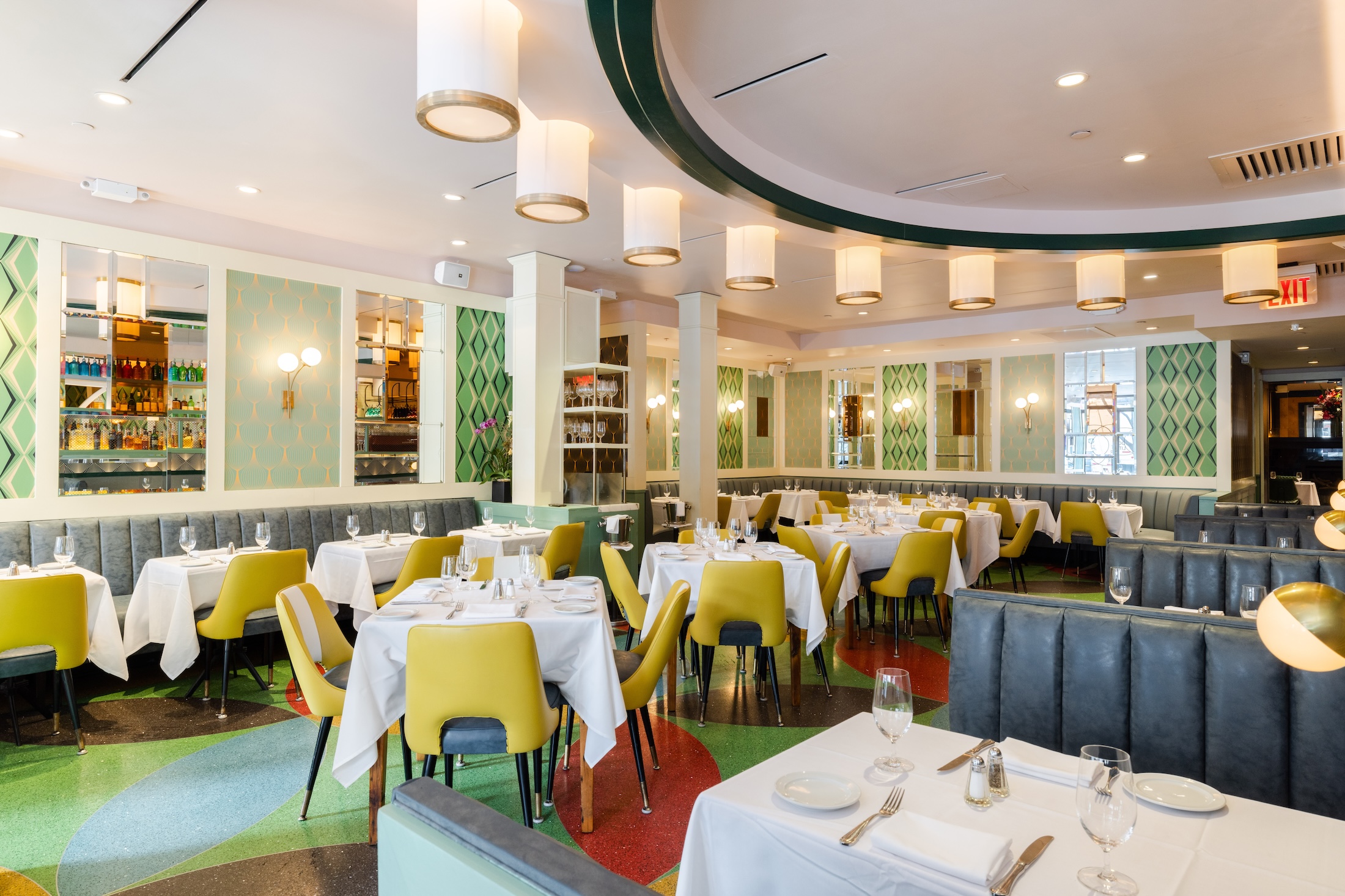 a restaurant with tables and chairs