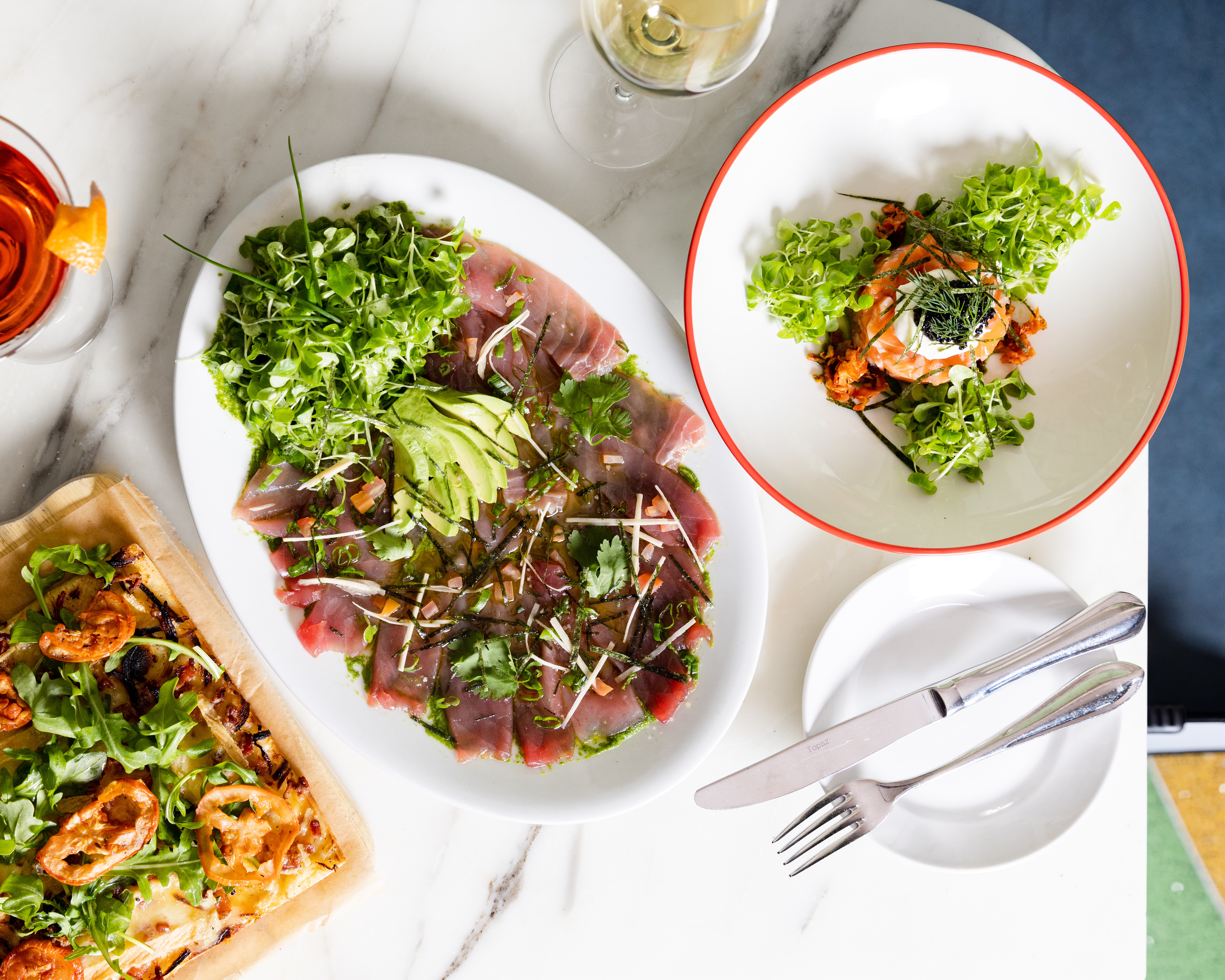 a bowl of food on a plate on a table