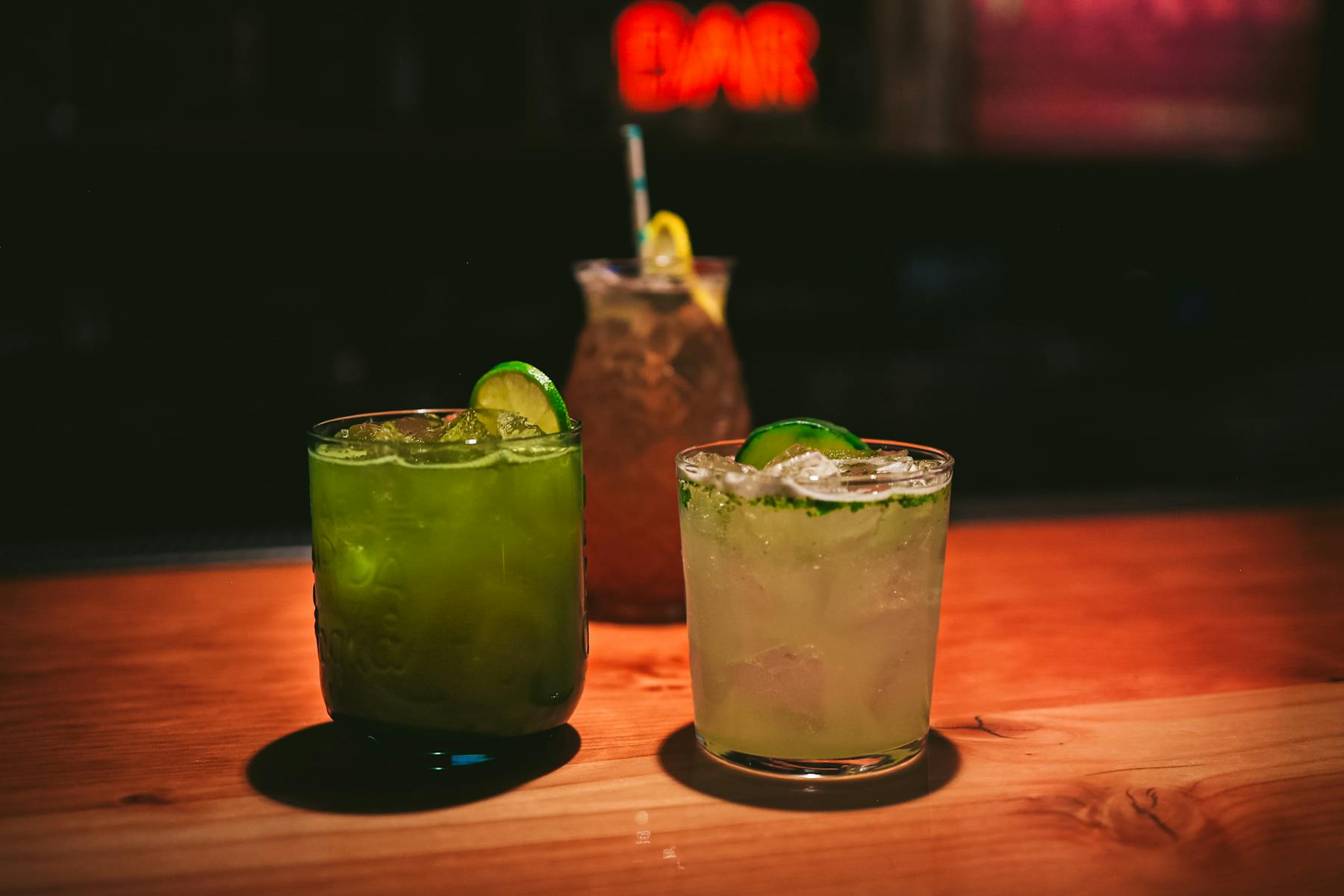 a glass of orange juice on a table