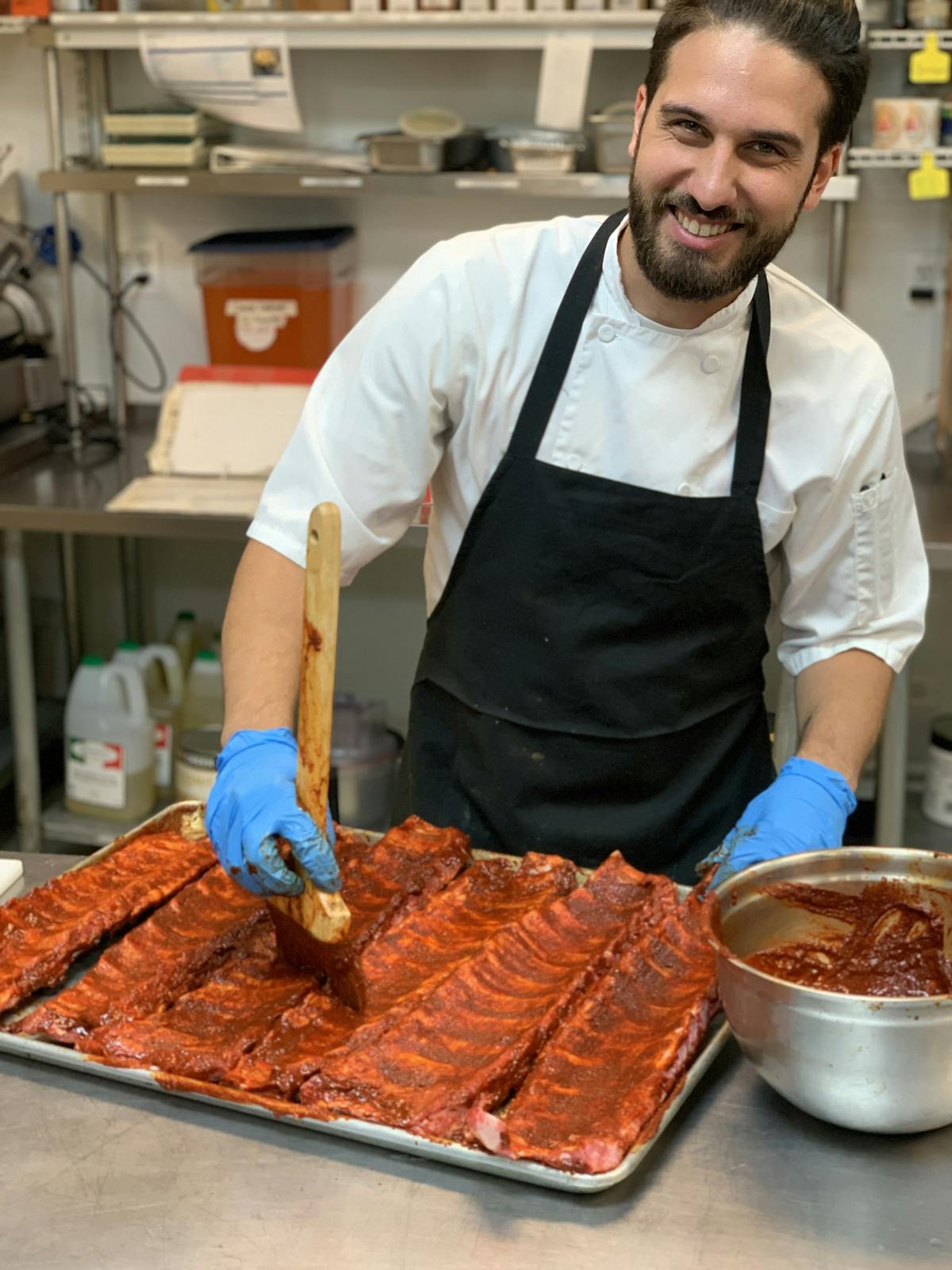 a man cooking meat