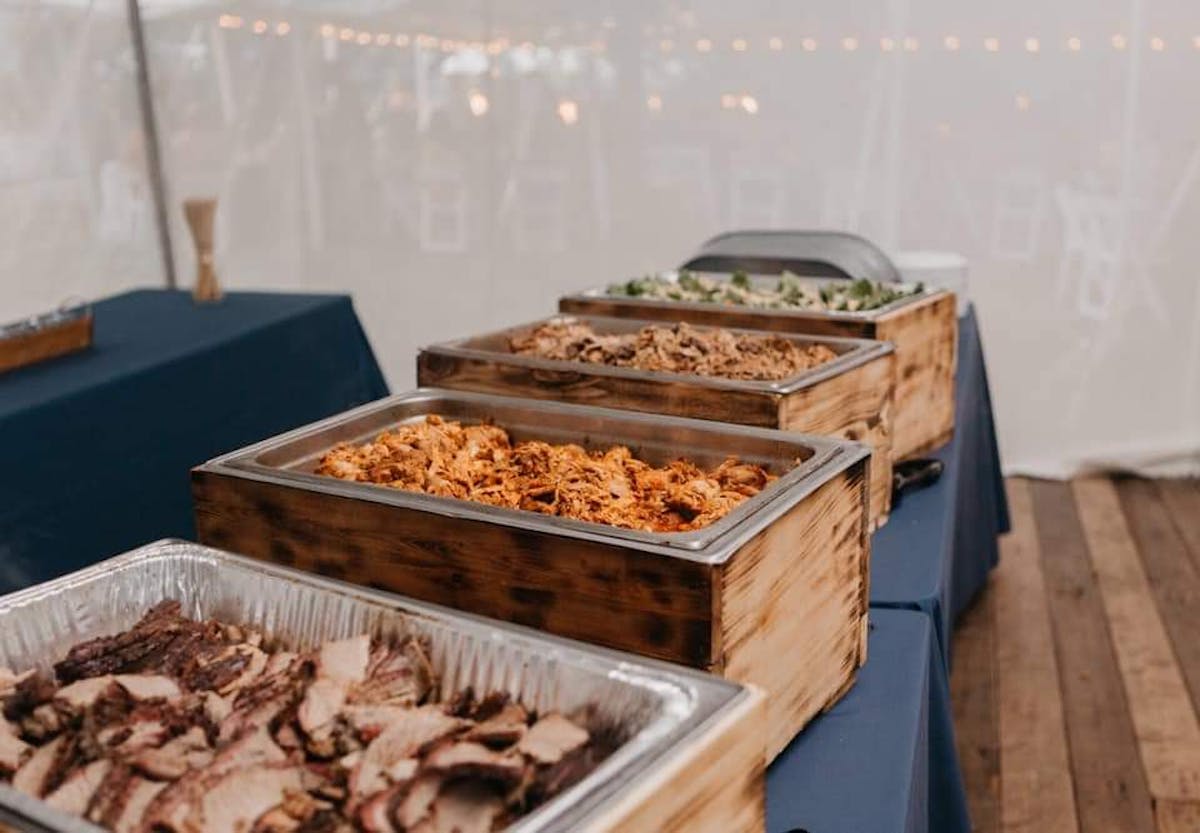 several trays of food on a table