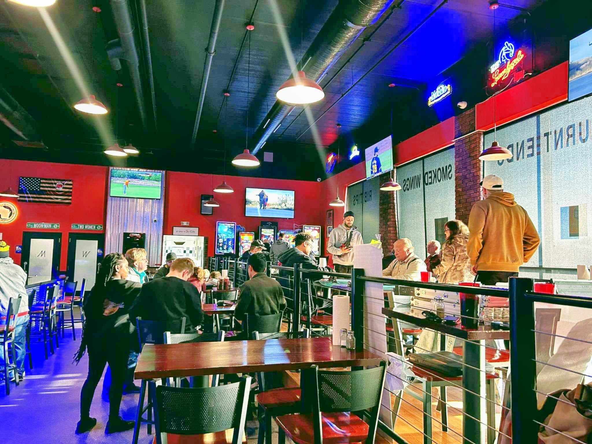 a group of people standing in front of a store