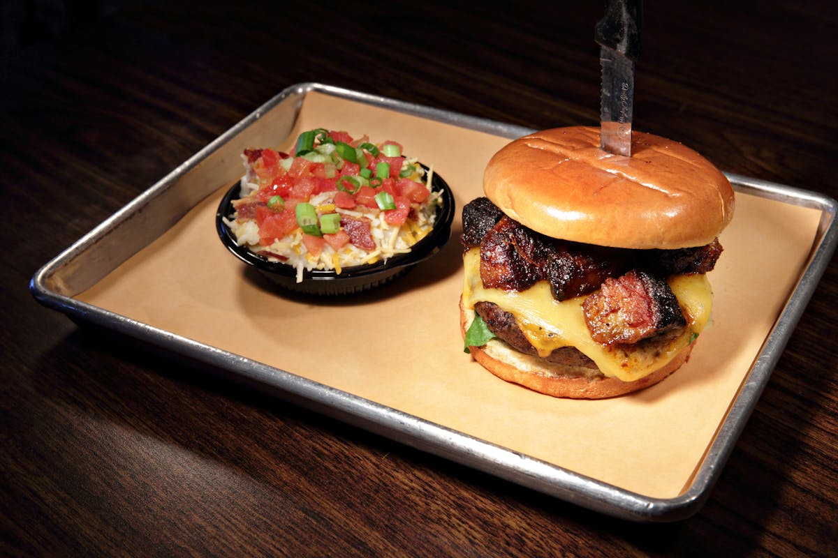 a hamburger on a tray
