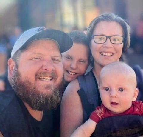 a group of people posing for the camera