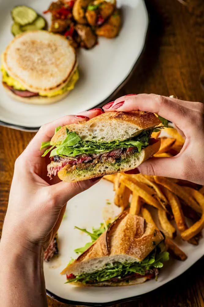 a sandwich cut in half on a plate