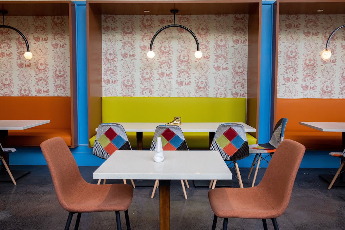 a desk with a chair in a room