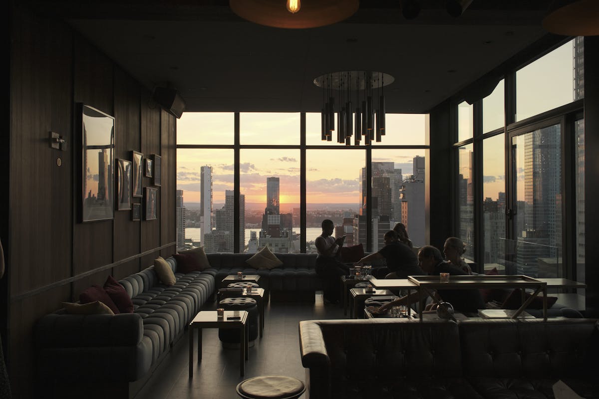 a room filled with furniture and a large window