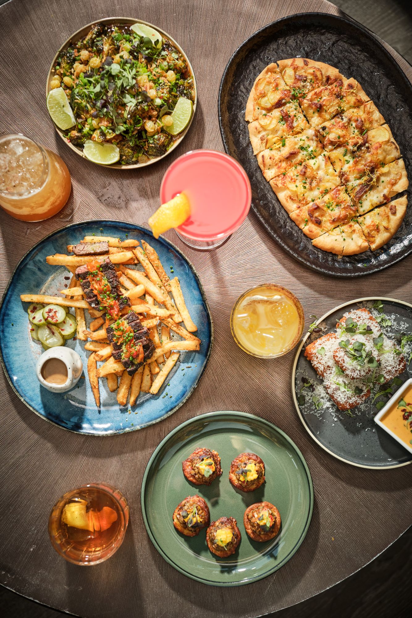 a bunch of food sitting on top of a wooden table