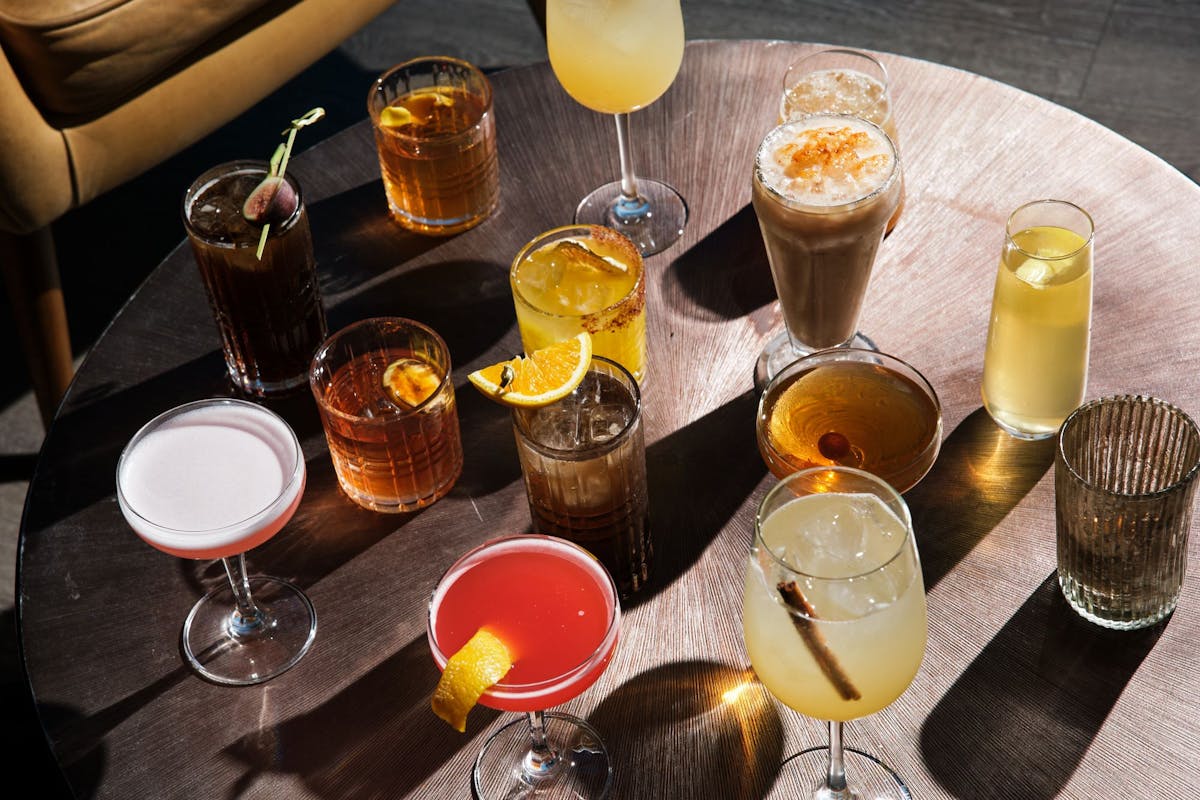 several cocktails on a table