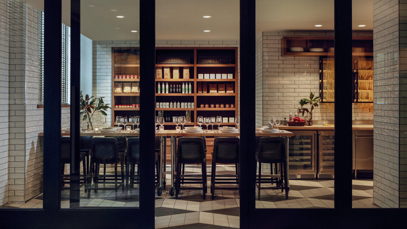 Glass-enclosed Chef's Table overlooking il Modo's pasta room.