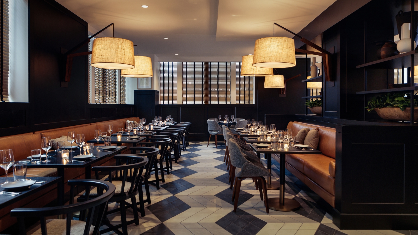 a restaurant with tables and chairs