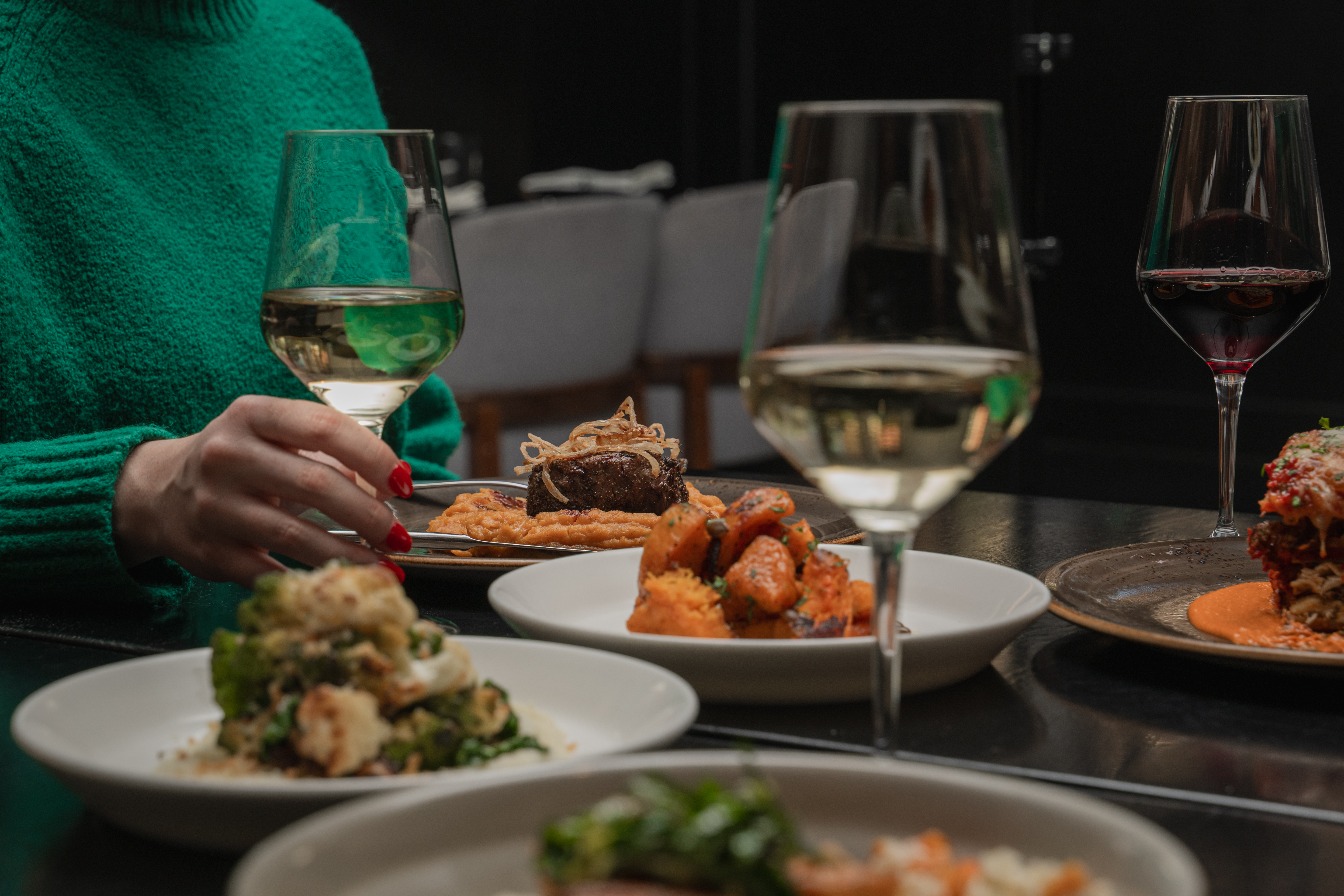 a person holding a plate of food