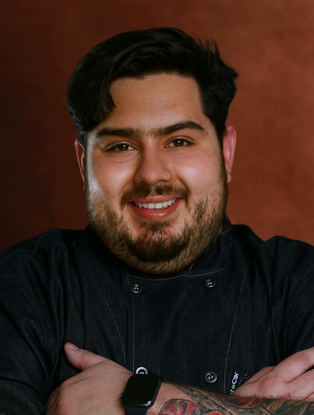 a chef looking at the camera