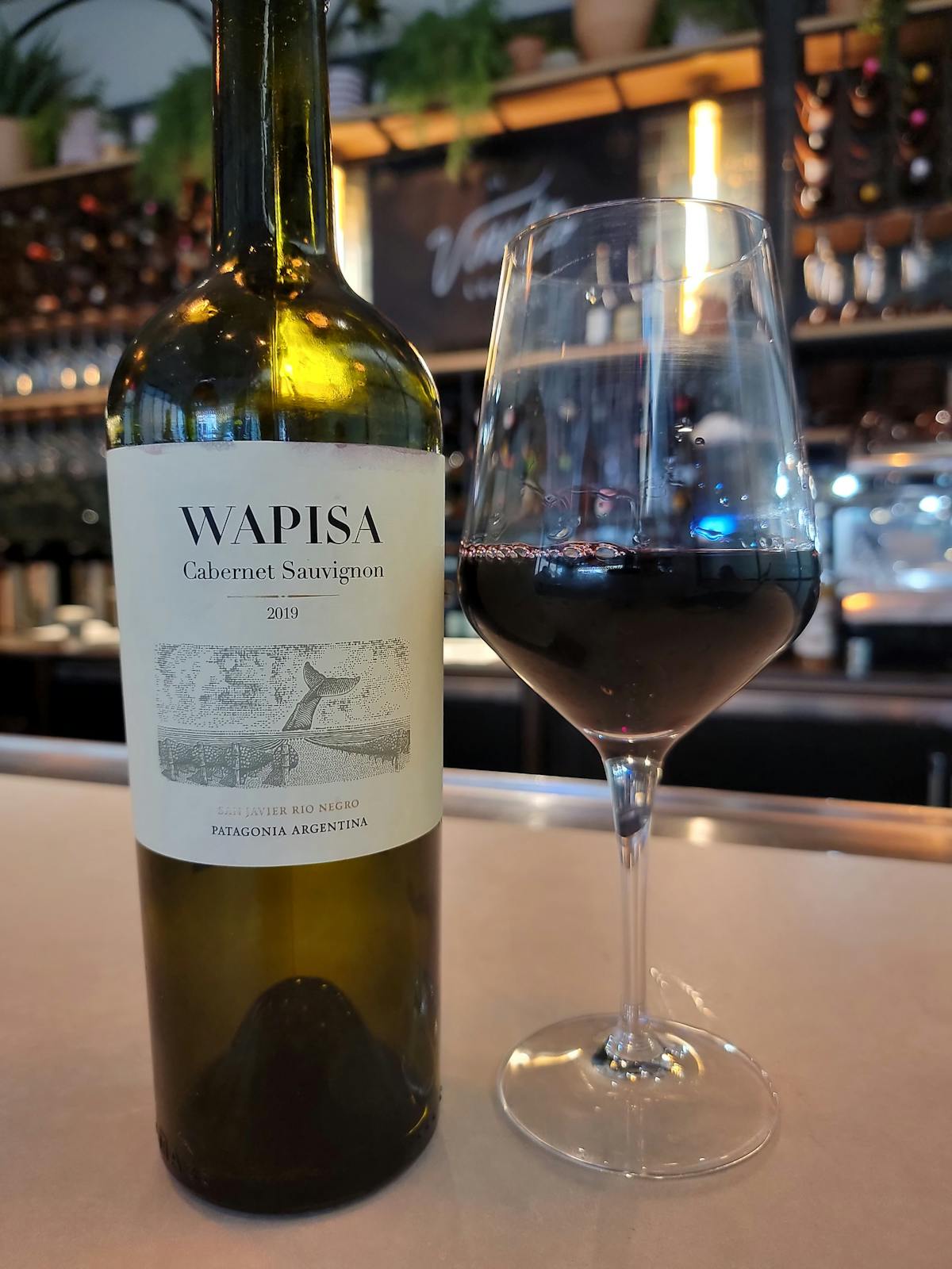 a bottle of wine on a table