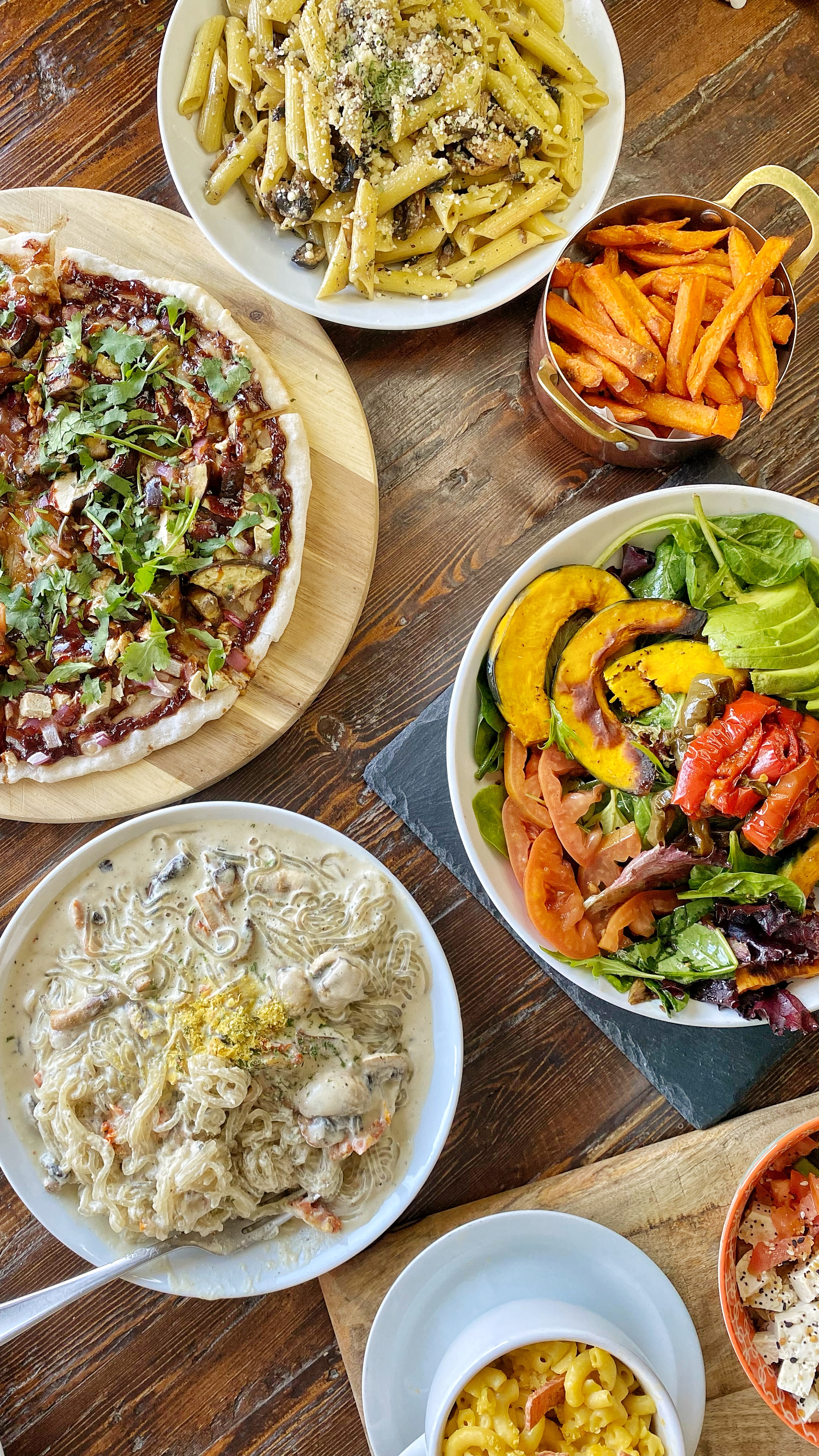 a plate of food sitting on top of a wooden table