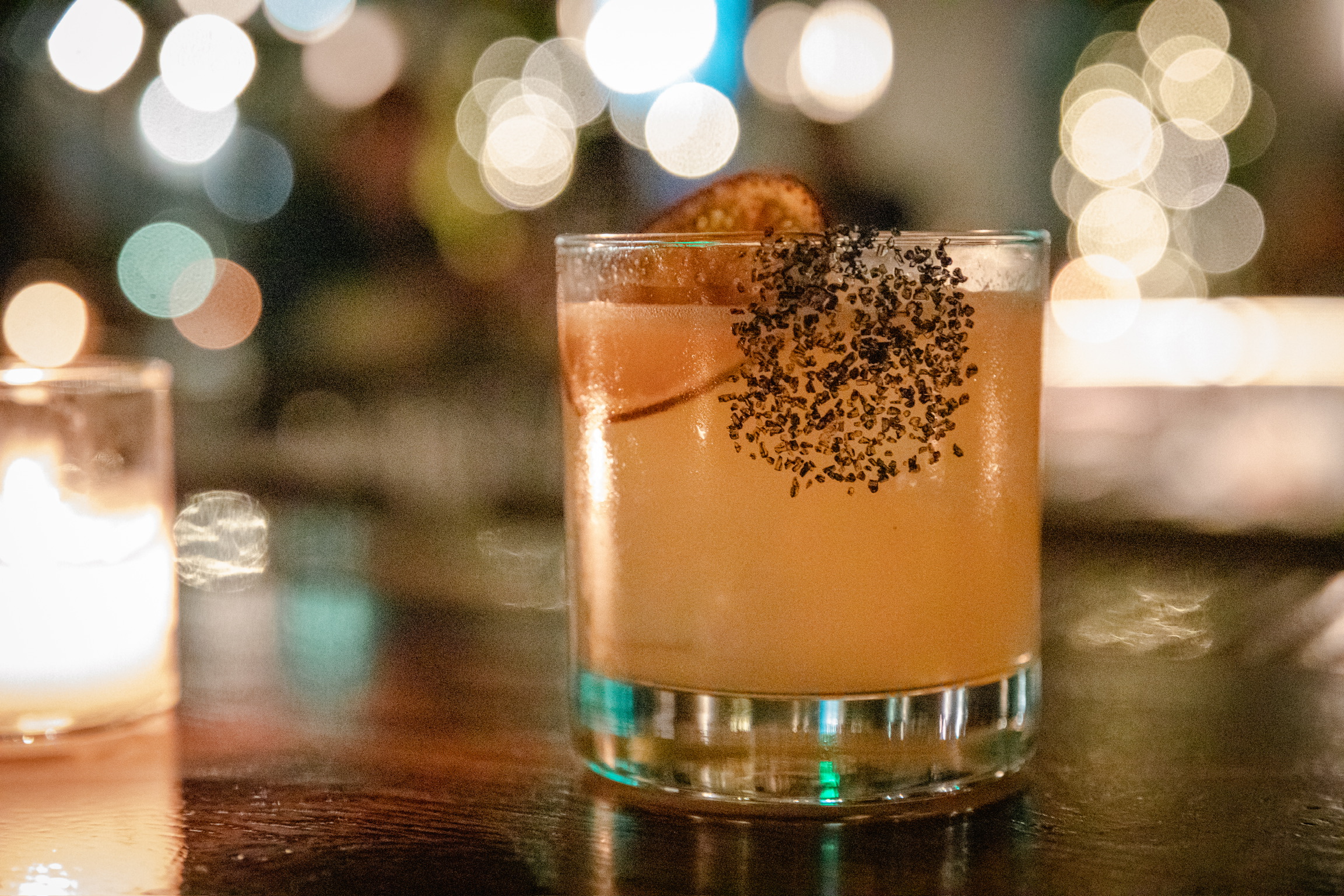 a glass of beer on a table