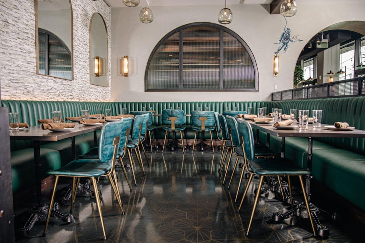 a dining room table in front of a building