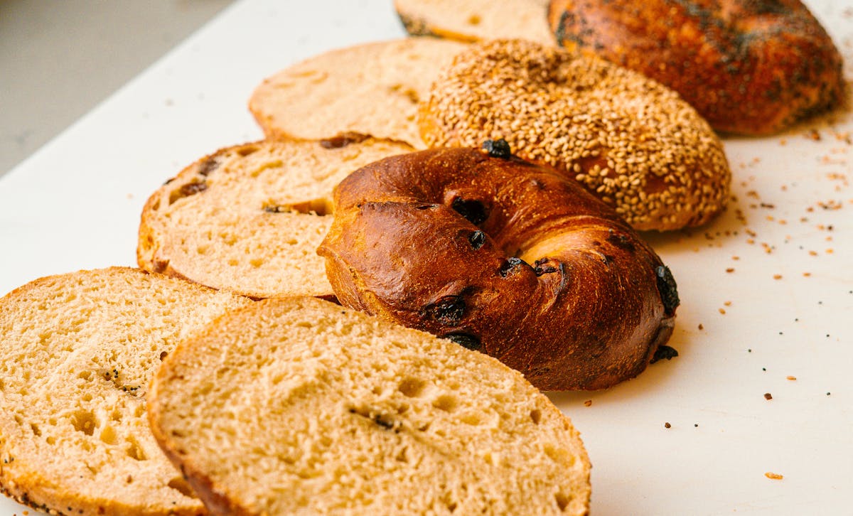 Sliced bagels on a cutting board