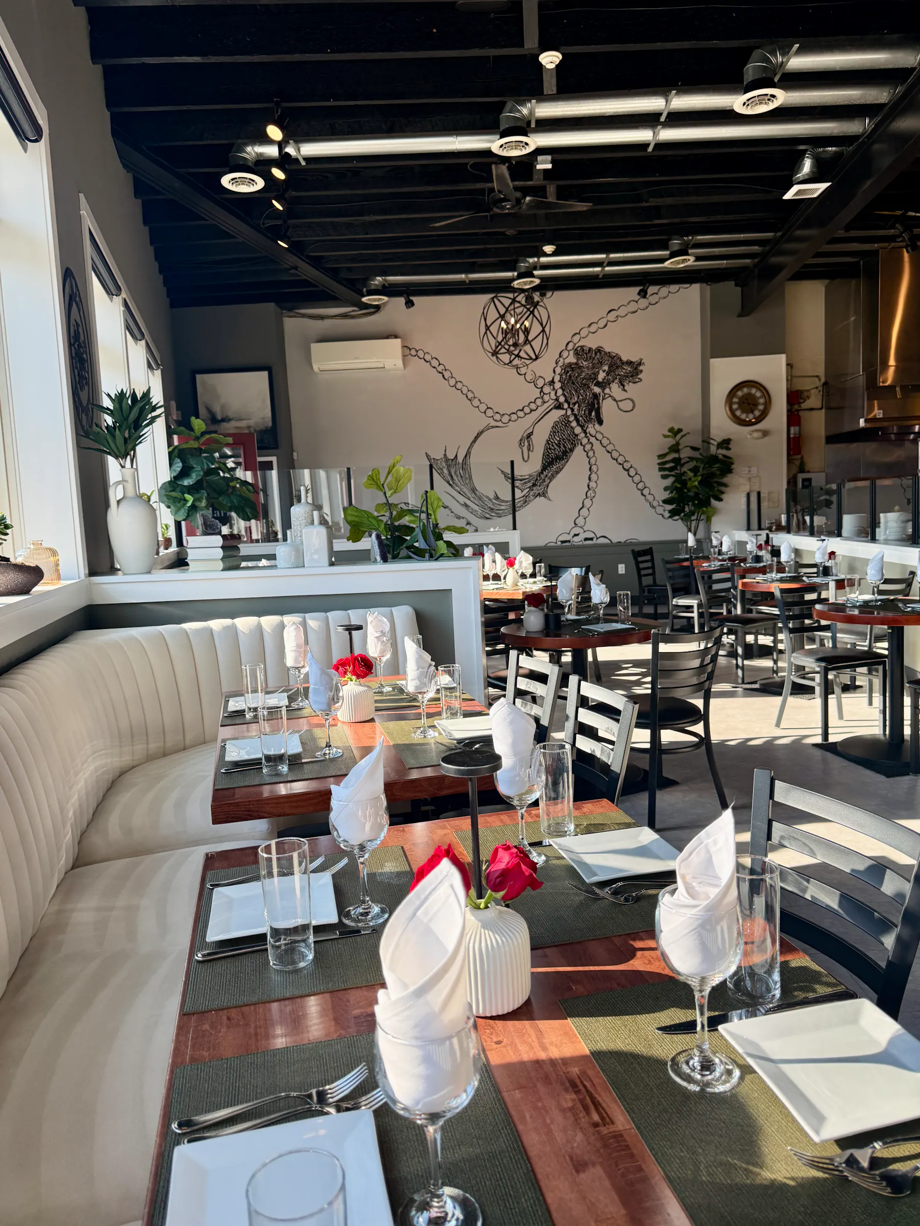 a restaurant with tables and chairs