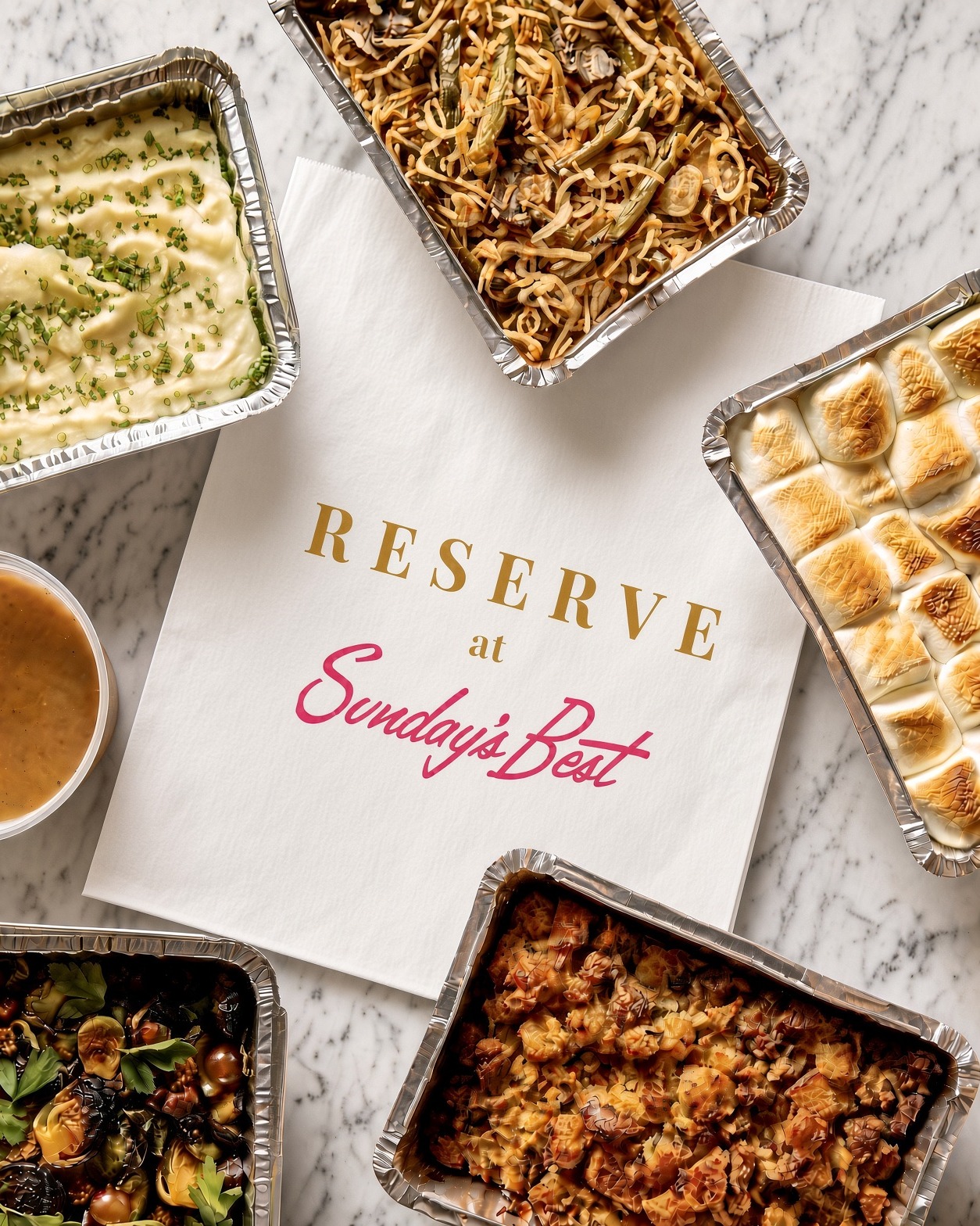 a group of food in foil trays