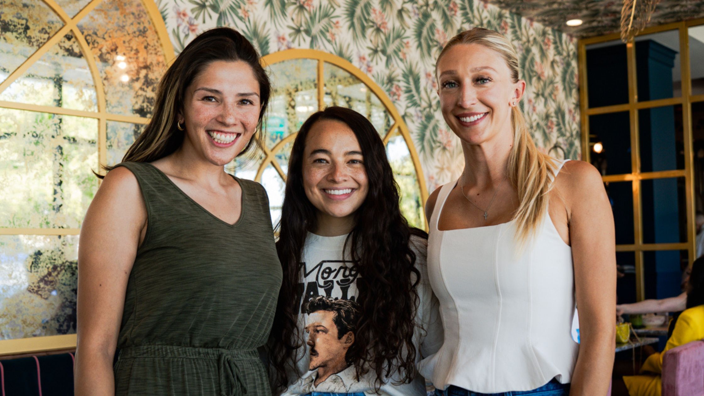 3 girls standing in room