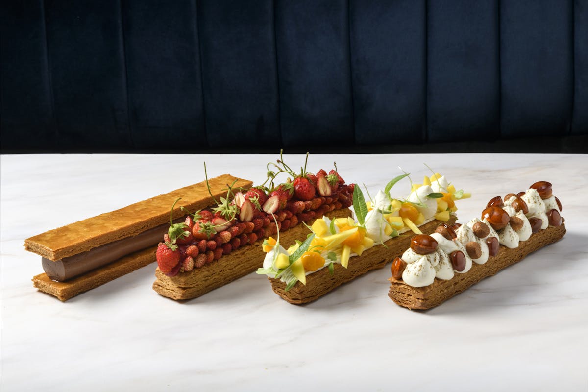 a couple of hot dogs sitting on a table