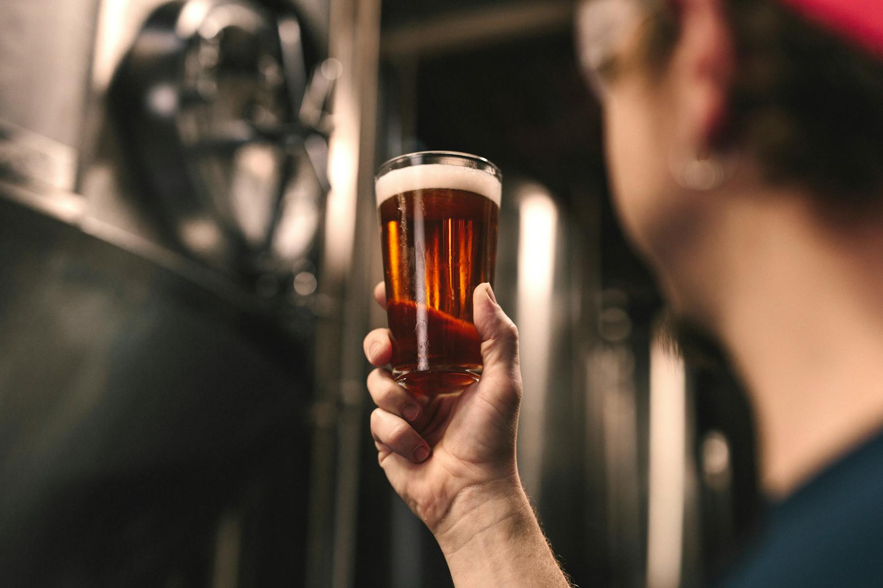 A man serving beer.