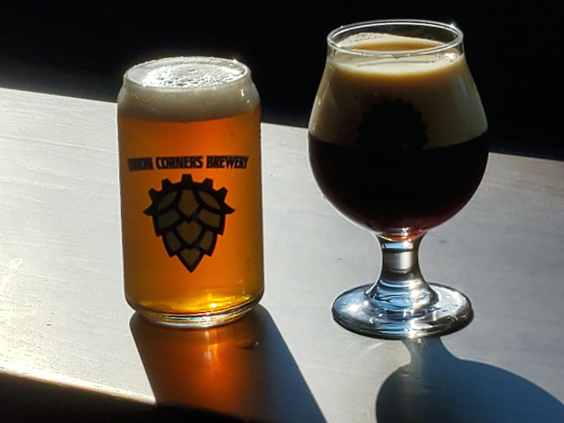 a glass of beer on a table