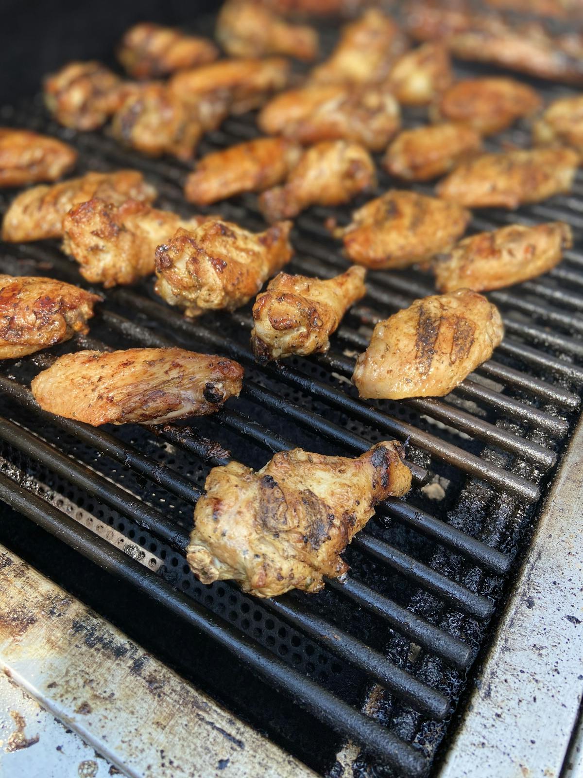 a pan of food on a grill