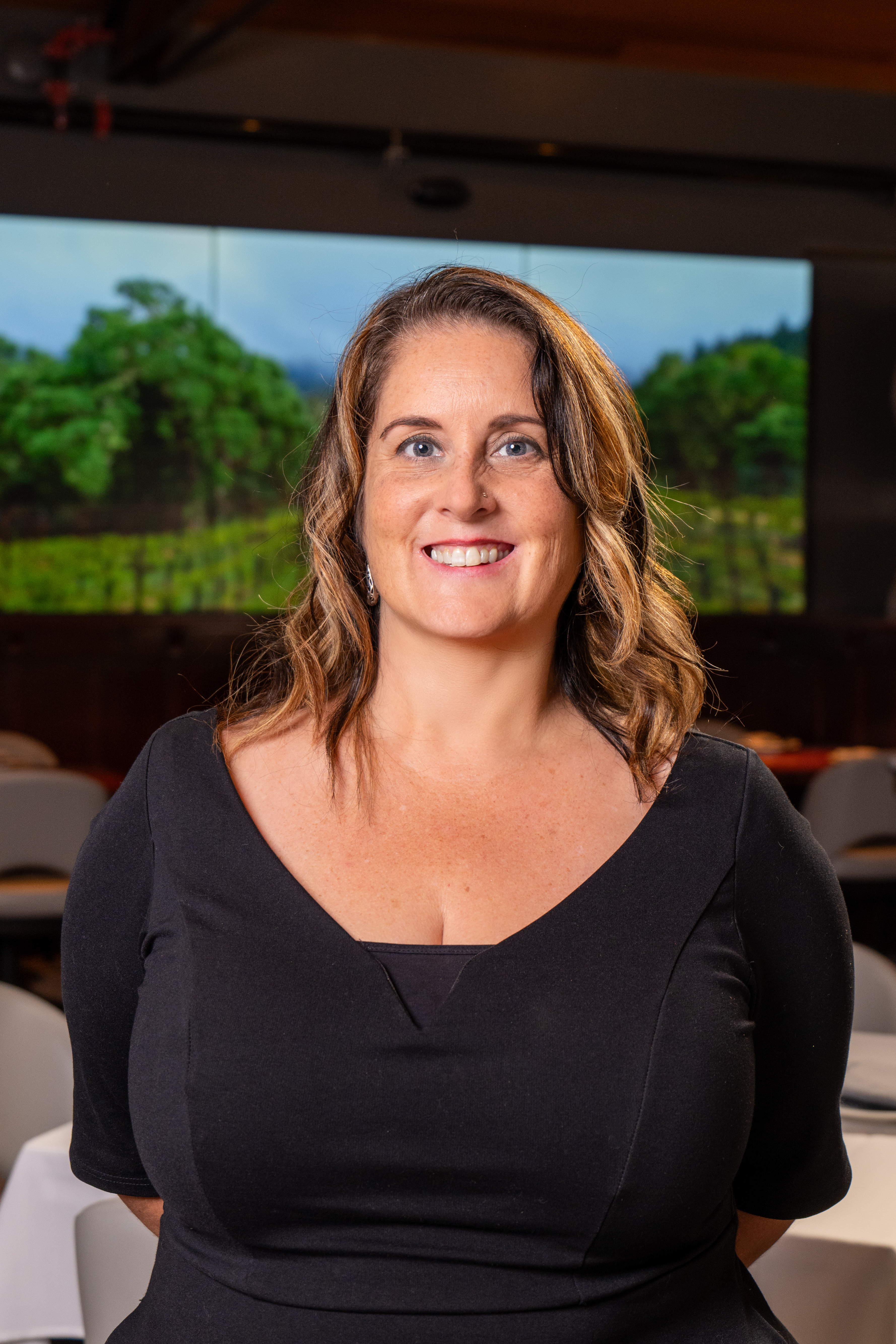 a person smiling for the camera