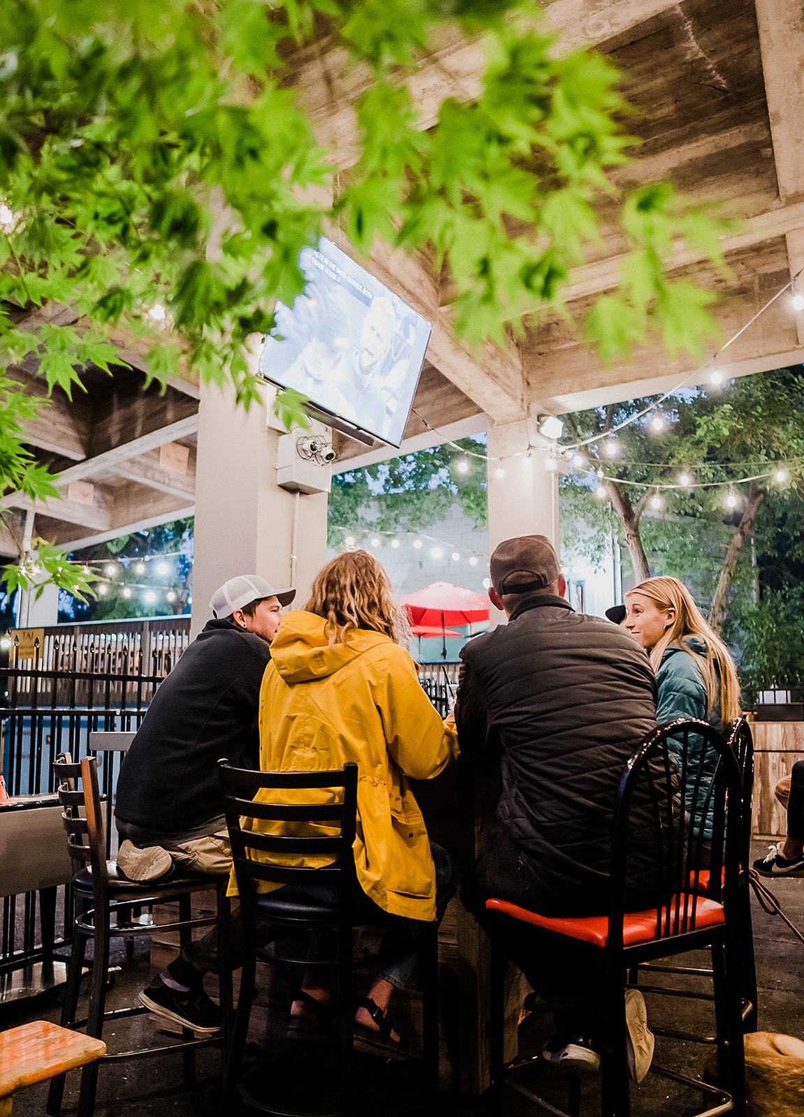 a group of people sitting on a bench