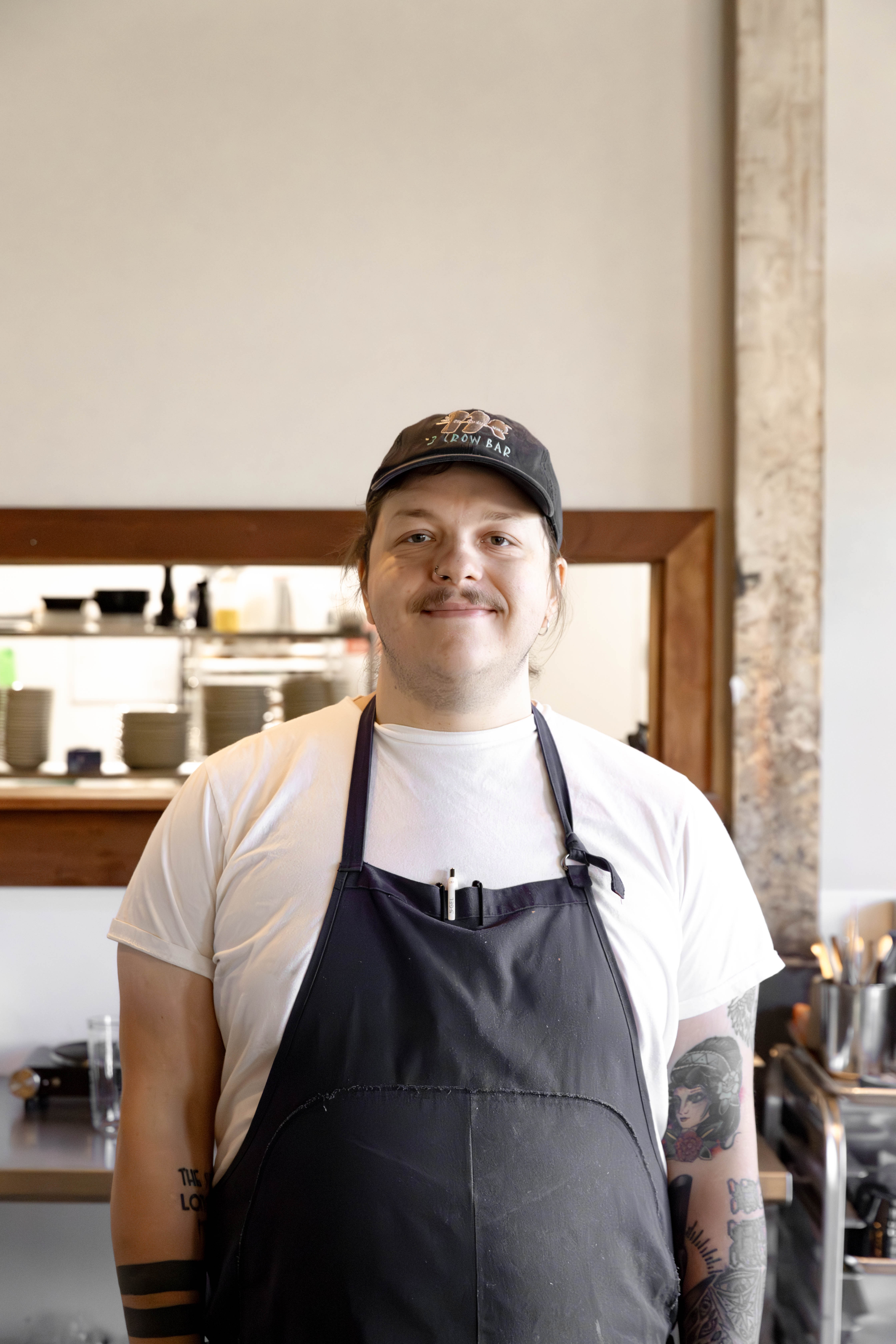 a man standing in a kitchen