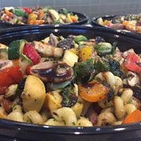 a dish is filled with vegetables and fruits