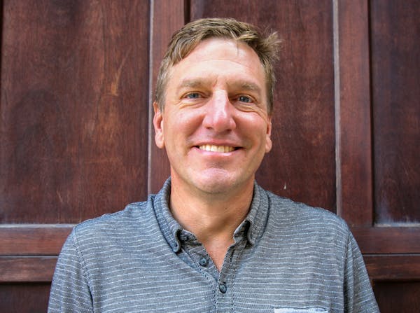 a man smiling for the camera