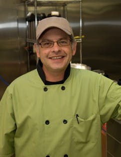 a man smiling for the camera