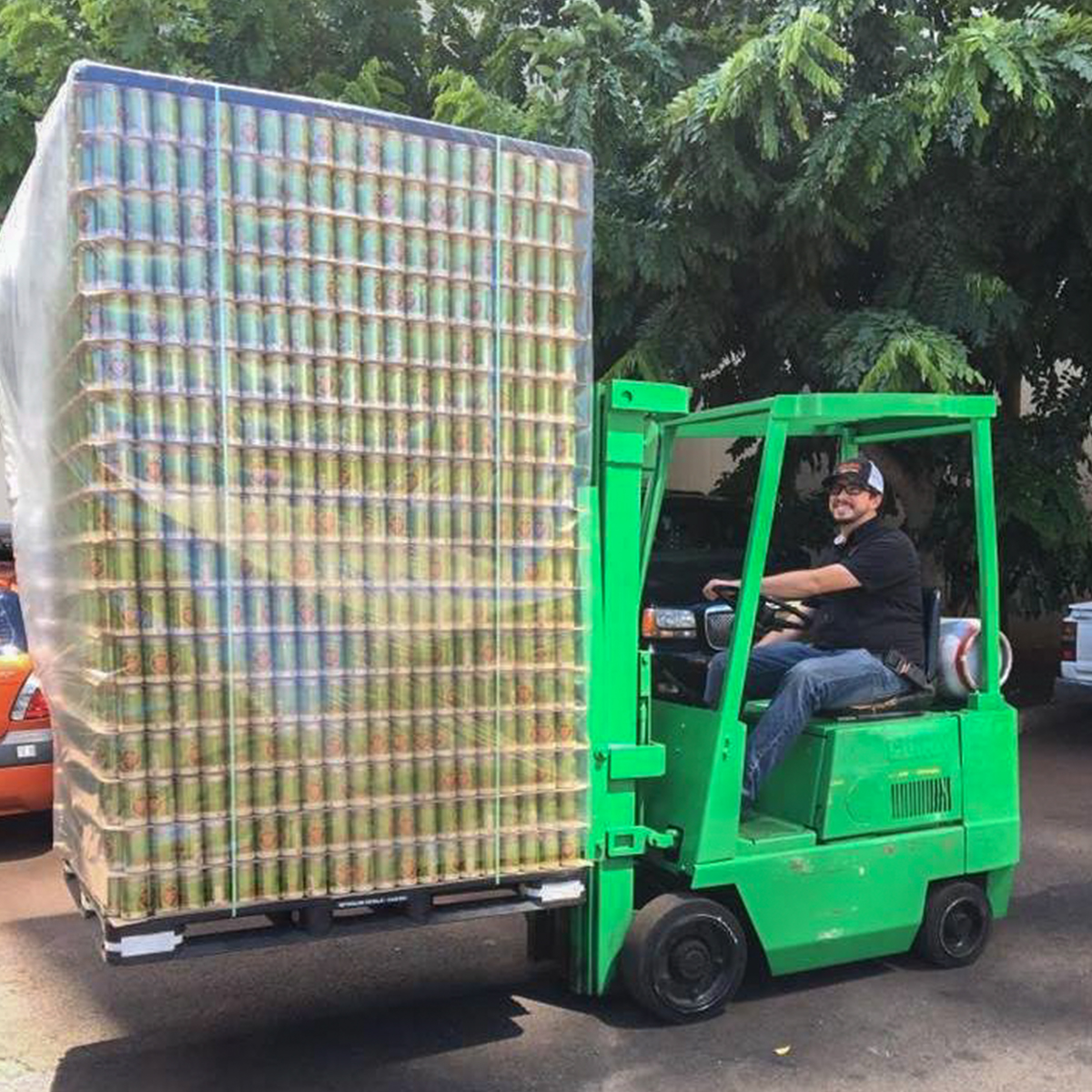 a person riding on the back of a truck