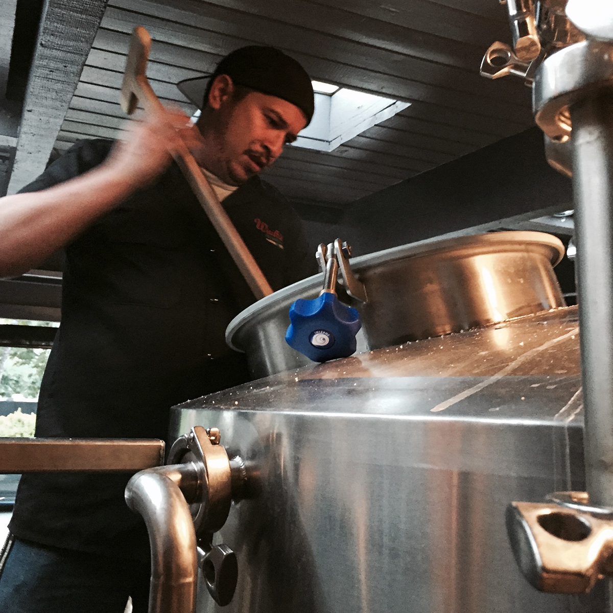 a man cooking on a stove