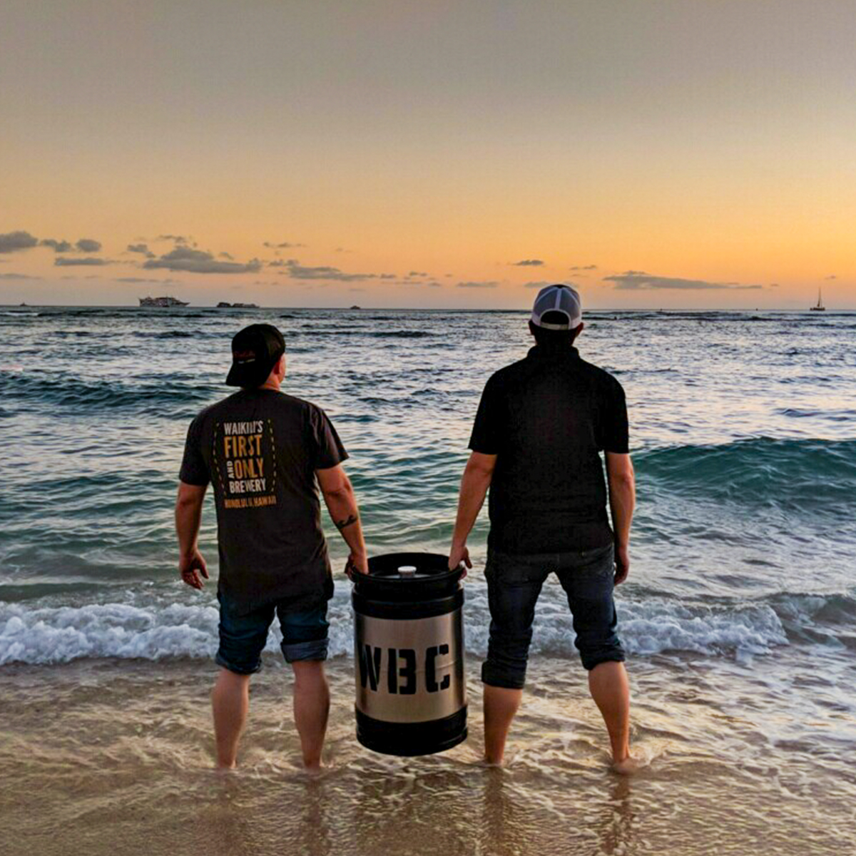 a man standing next to a body of water