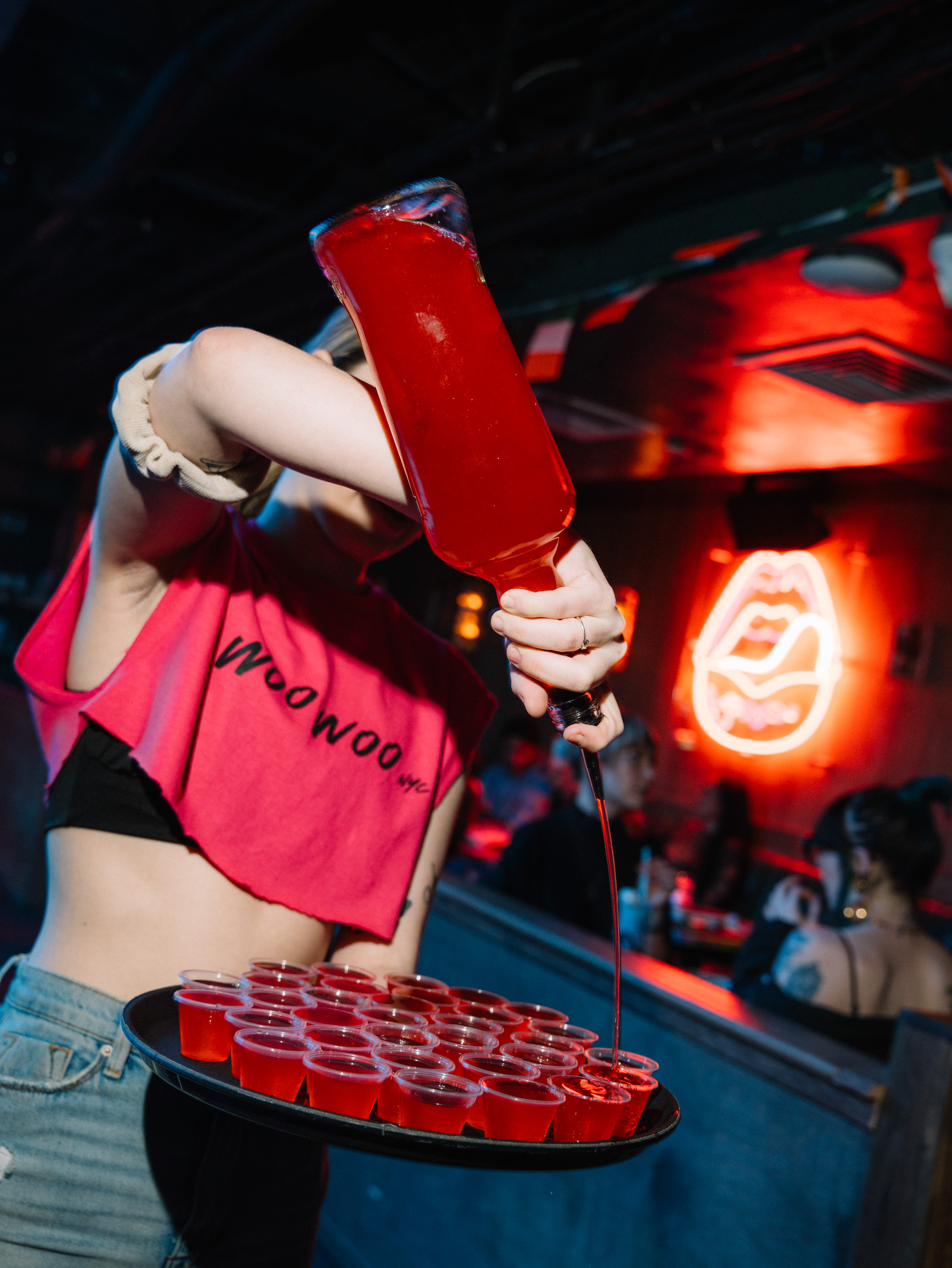 a server pouring drinks