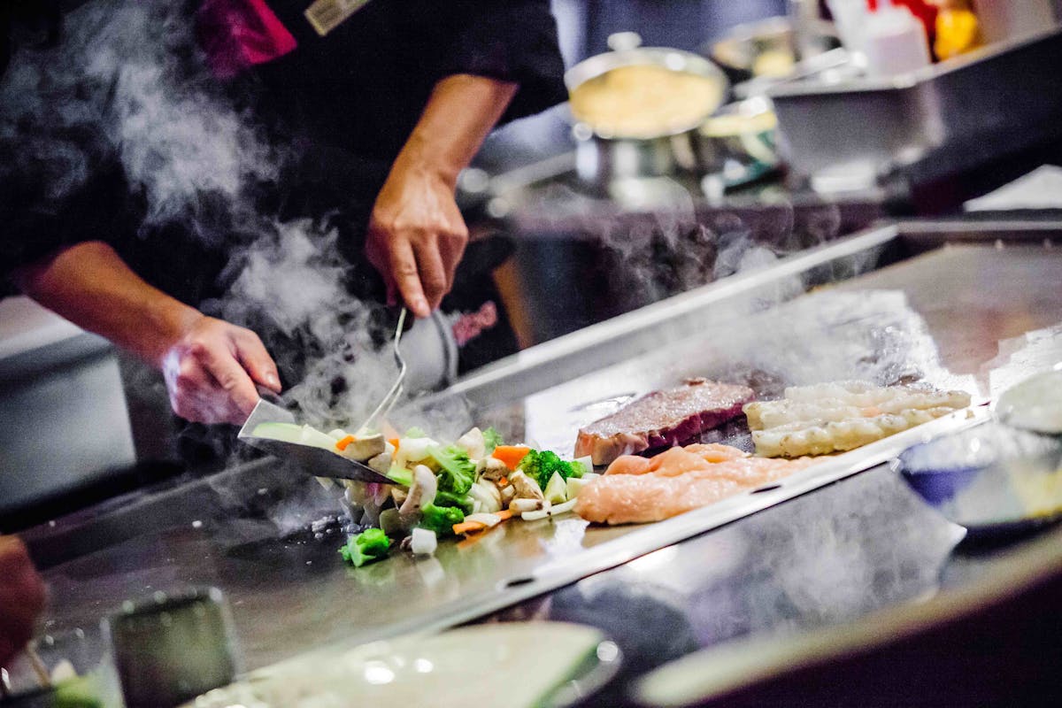 a person preparing food in a kitchen