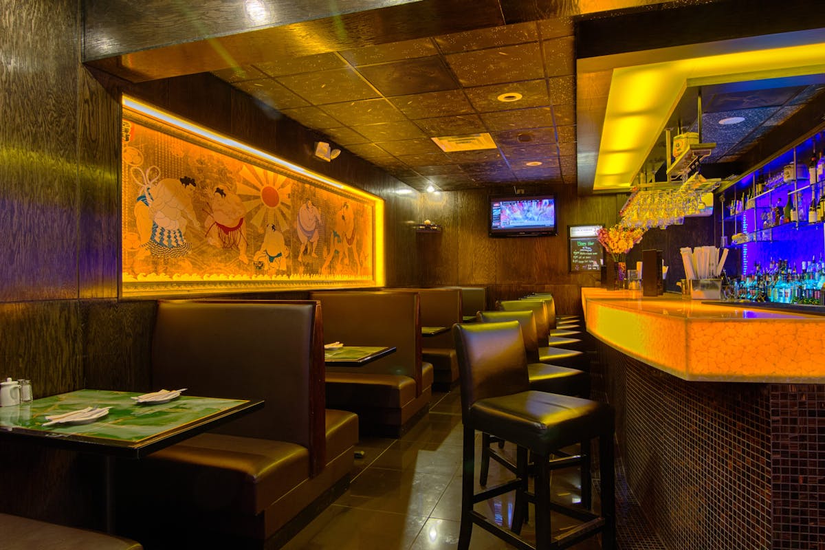 a kitchen with a table in a restaurant