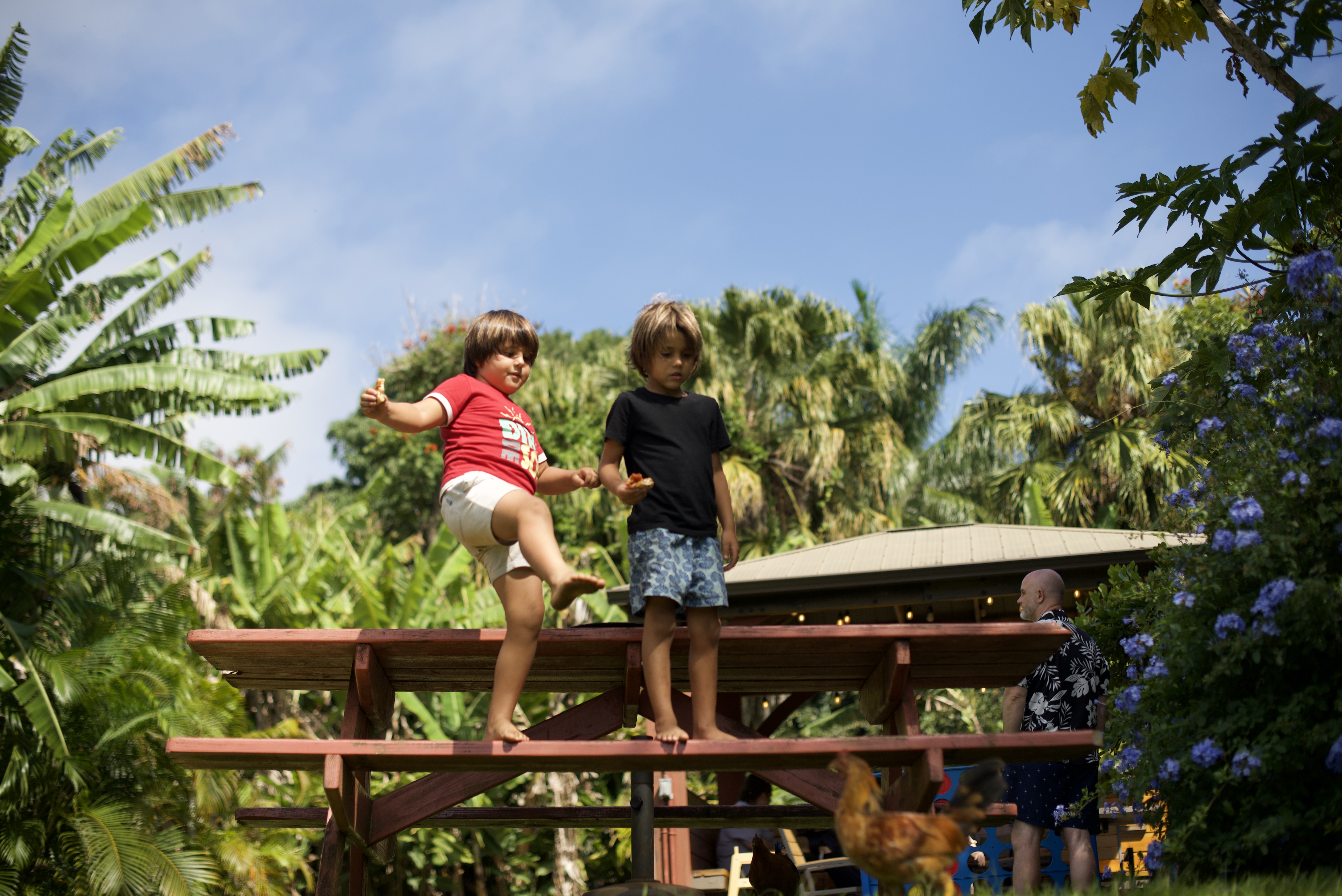 two children on a picnic table