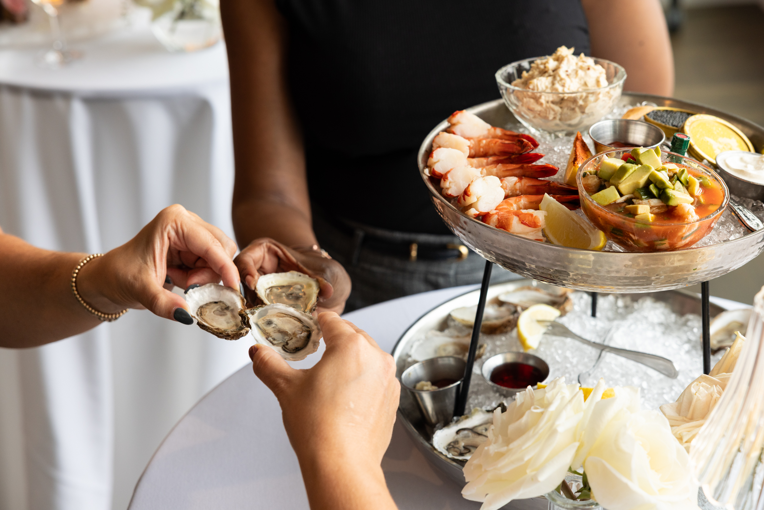 a woman holding a plate of food