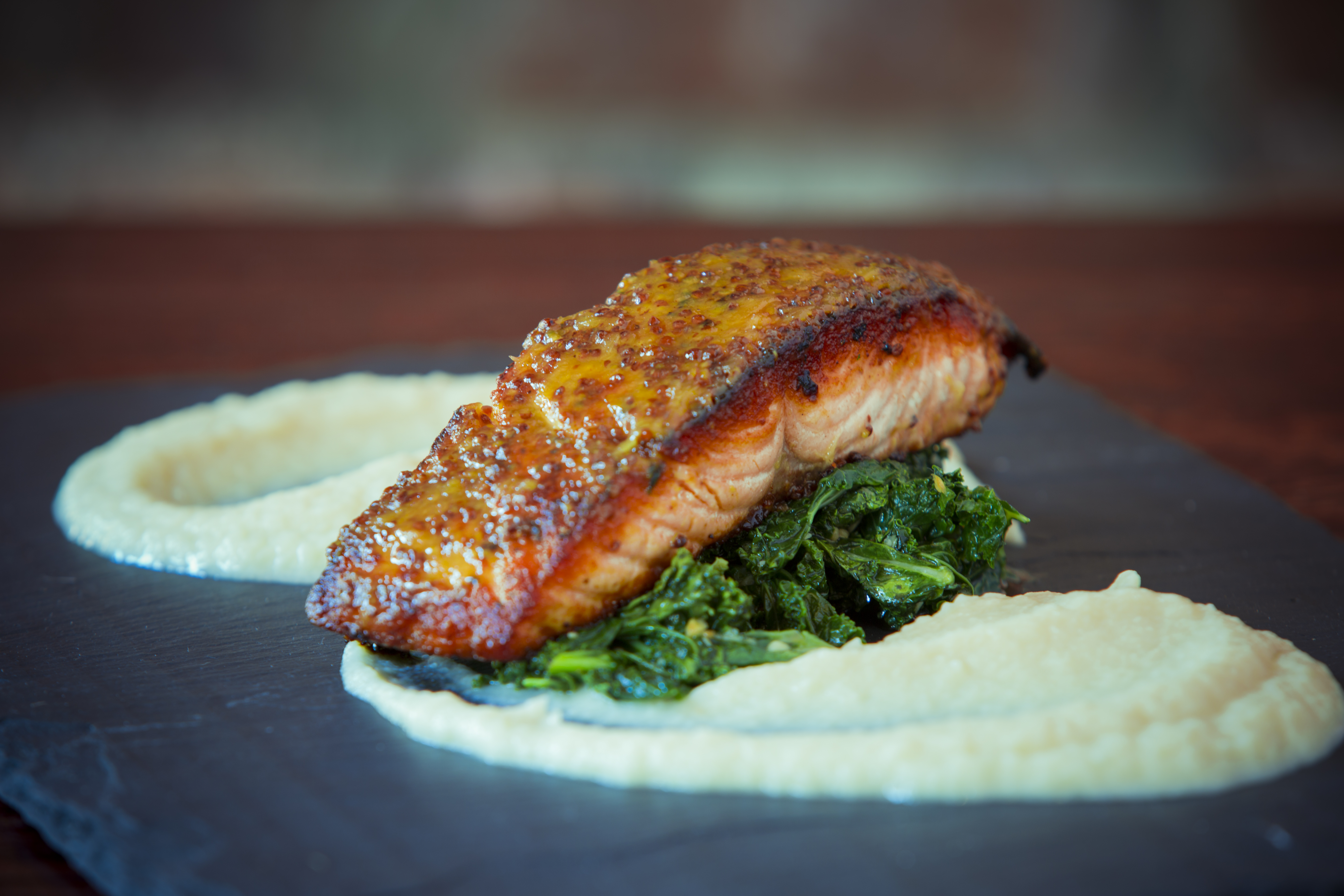 a close up of a plate of food with a slice of pizza