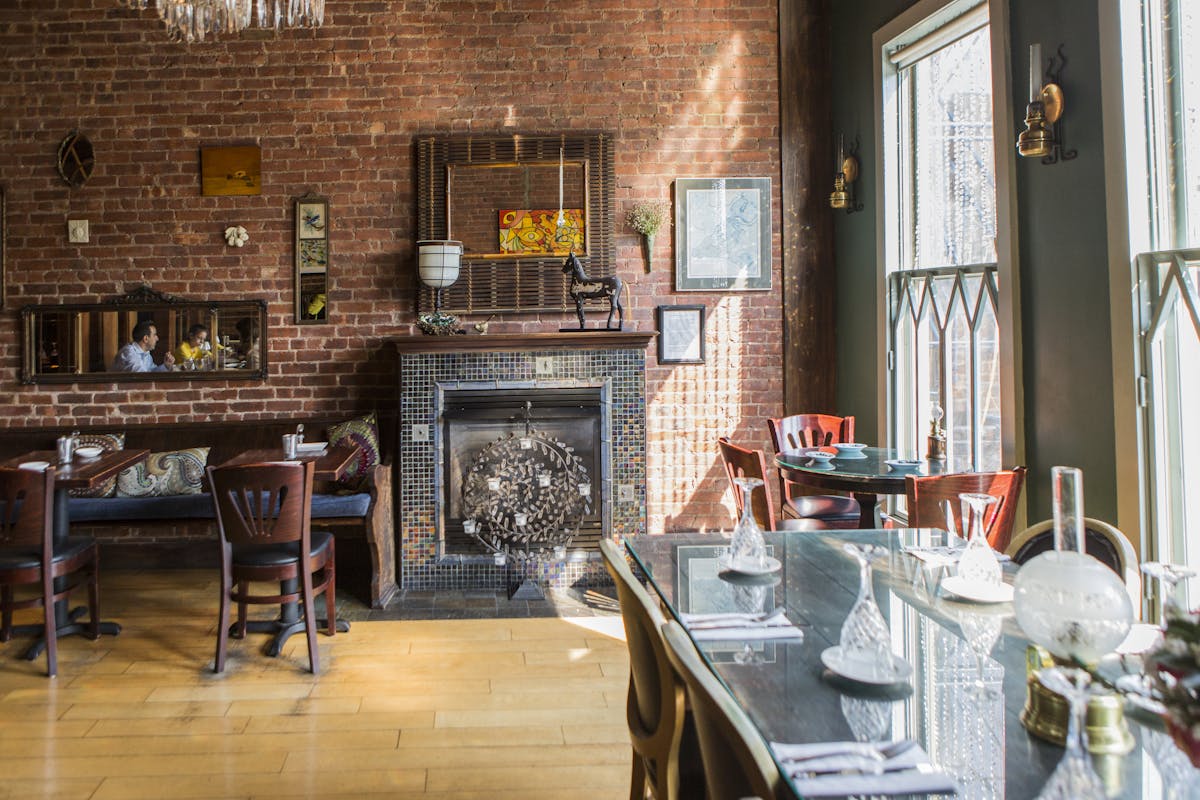 a living room filled with furniture and a fire place