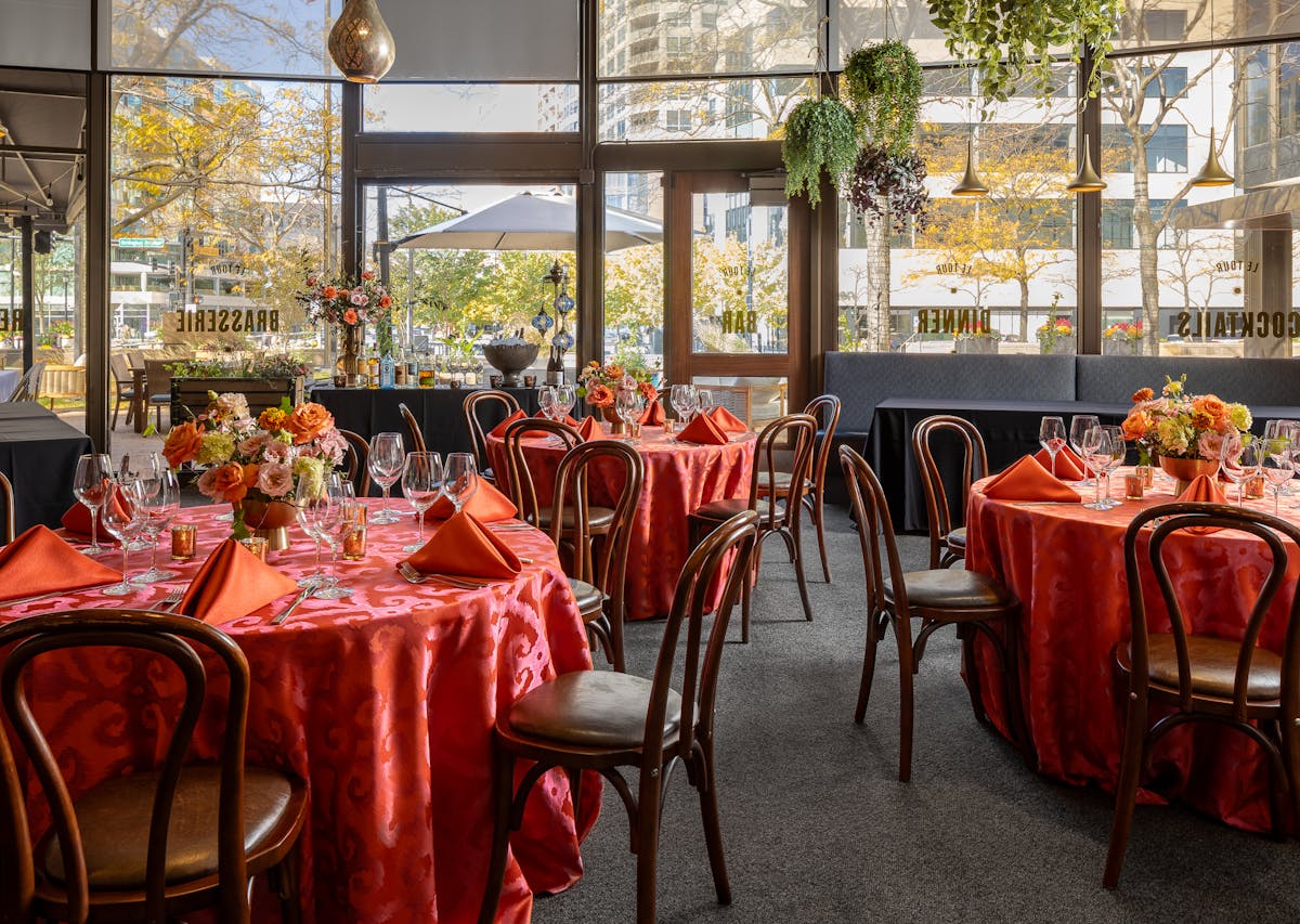a dining room table in front of a window