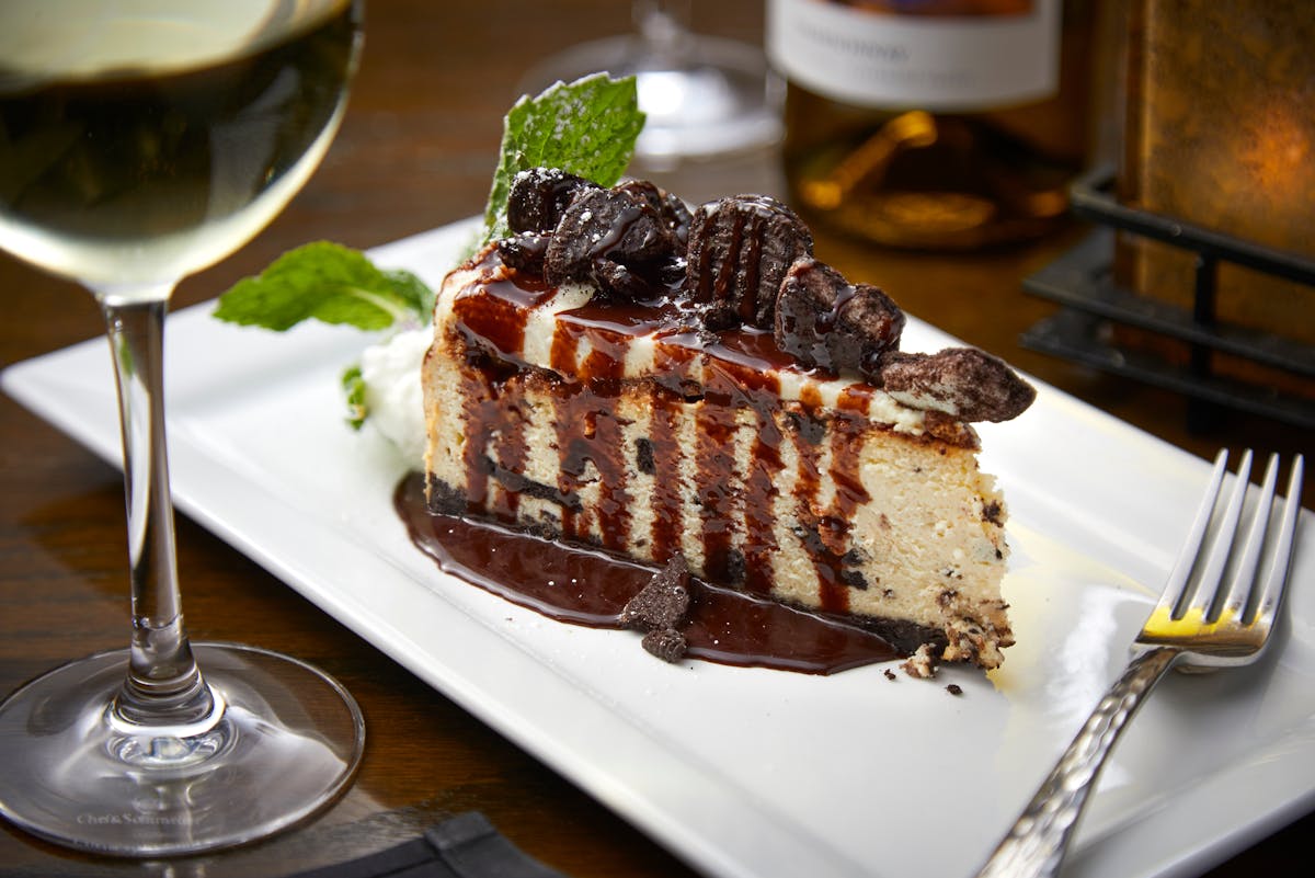 a piece of cake on a plate with a fork