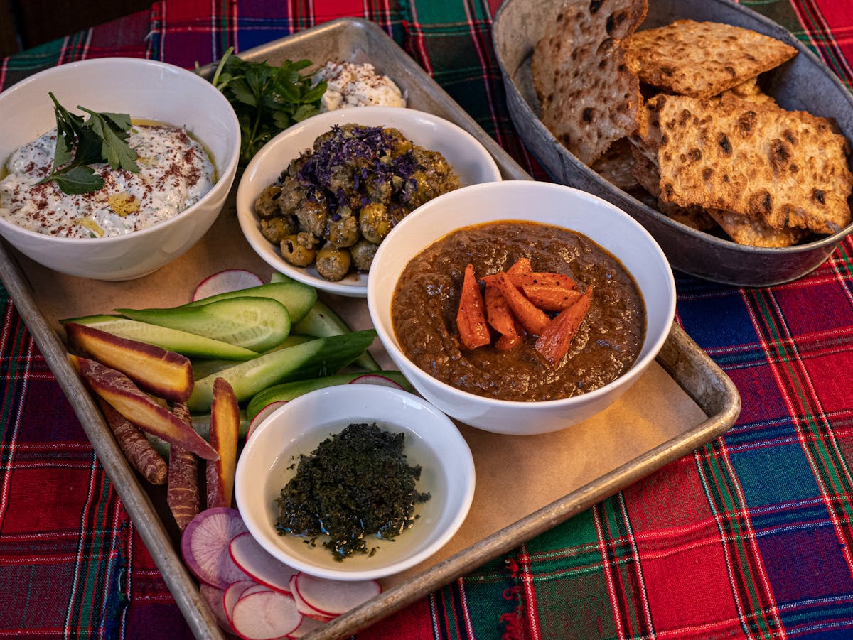 a bowl filled with different types of food on a table