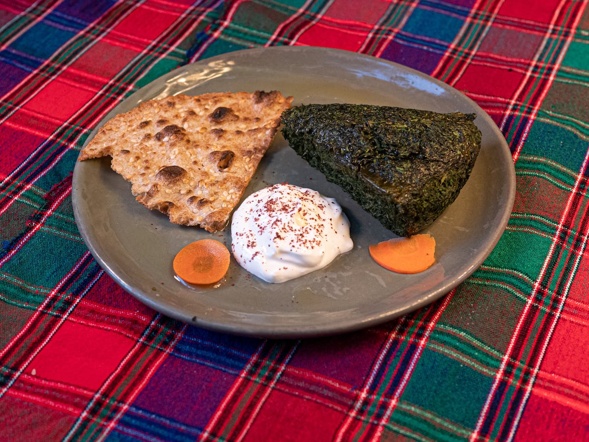 a plate of food with a fork